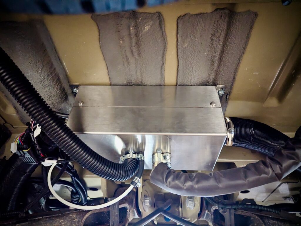 Pose de chauffage stationnaire Autoterm Air 2D sous châssis